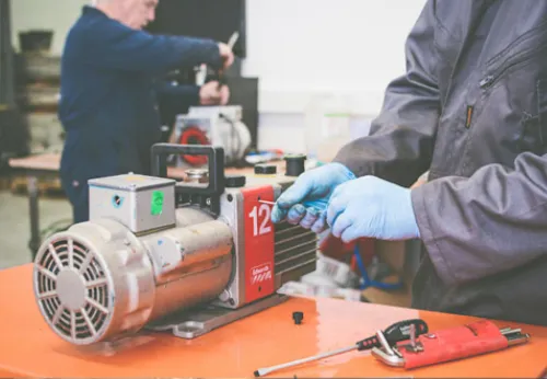 Vacuum pump repair services including turbomolecular, rotary vane, dry, and diffusion pumps by skilled technicians