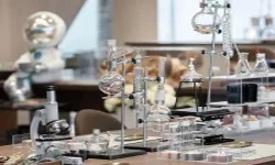 Scientist using laboratory microscope during research and development testing